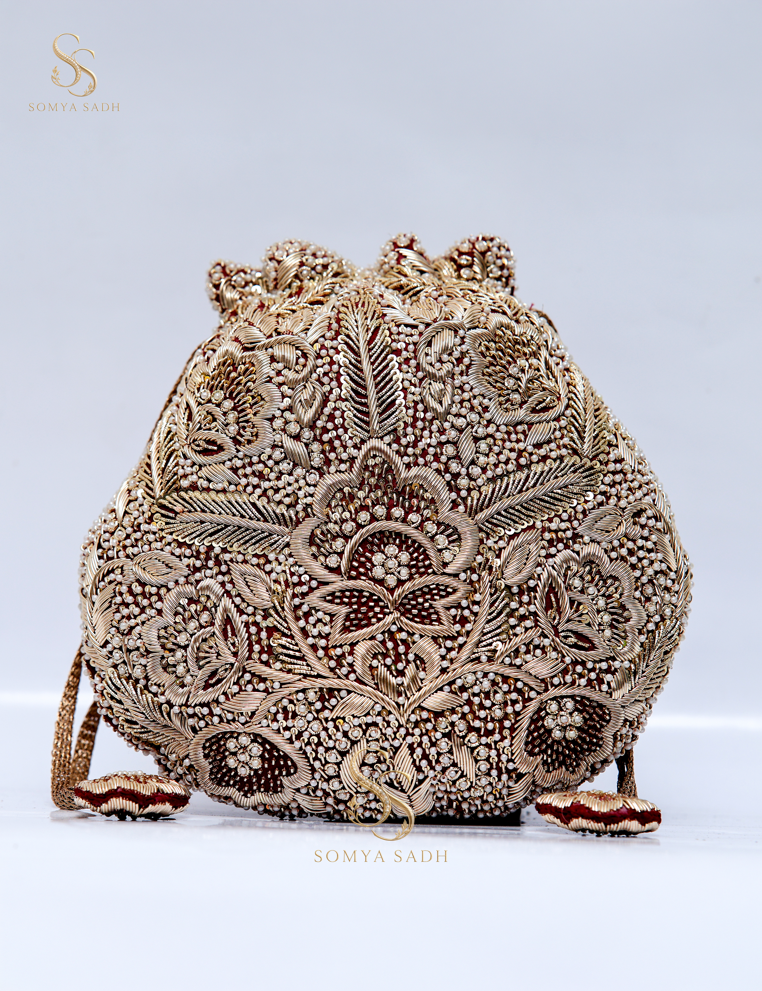 Nazakat Ivory Burgundy Filigree Potli, detail or alternate product view
