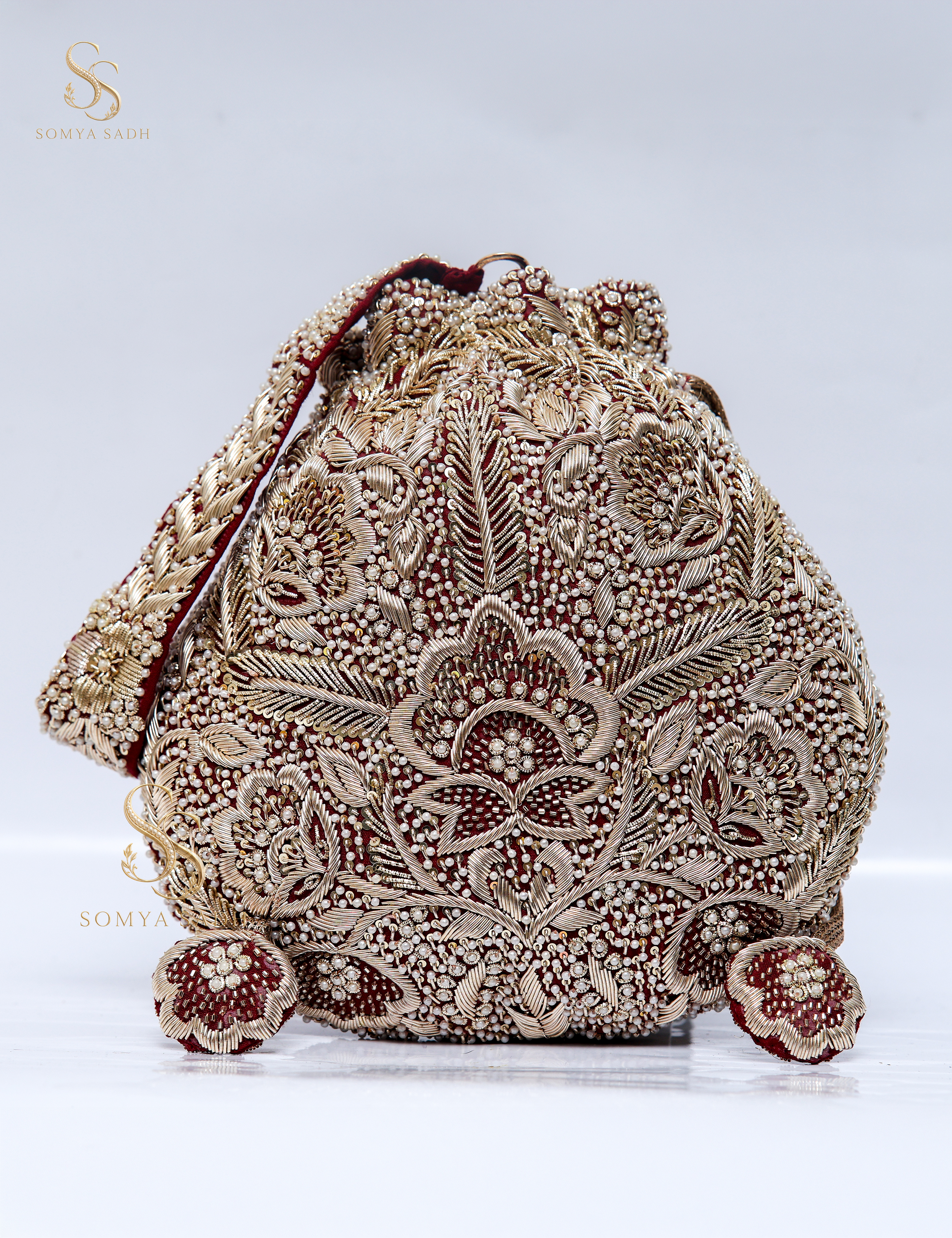 Nazakat Ivory Burgundy Filigree Potli, detail or alternate product view