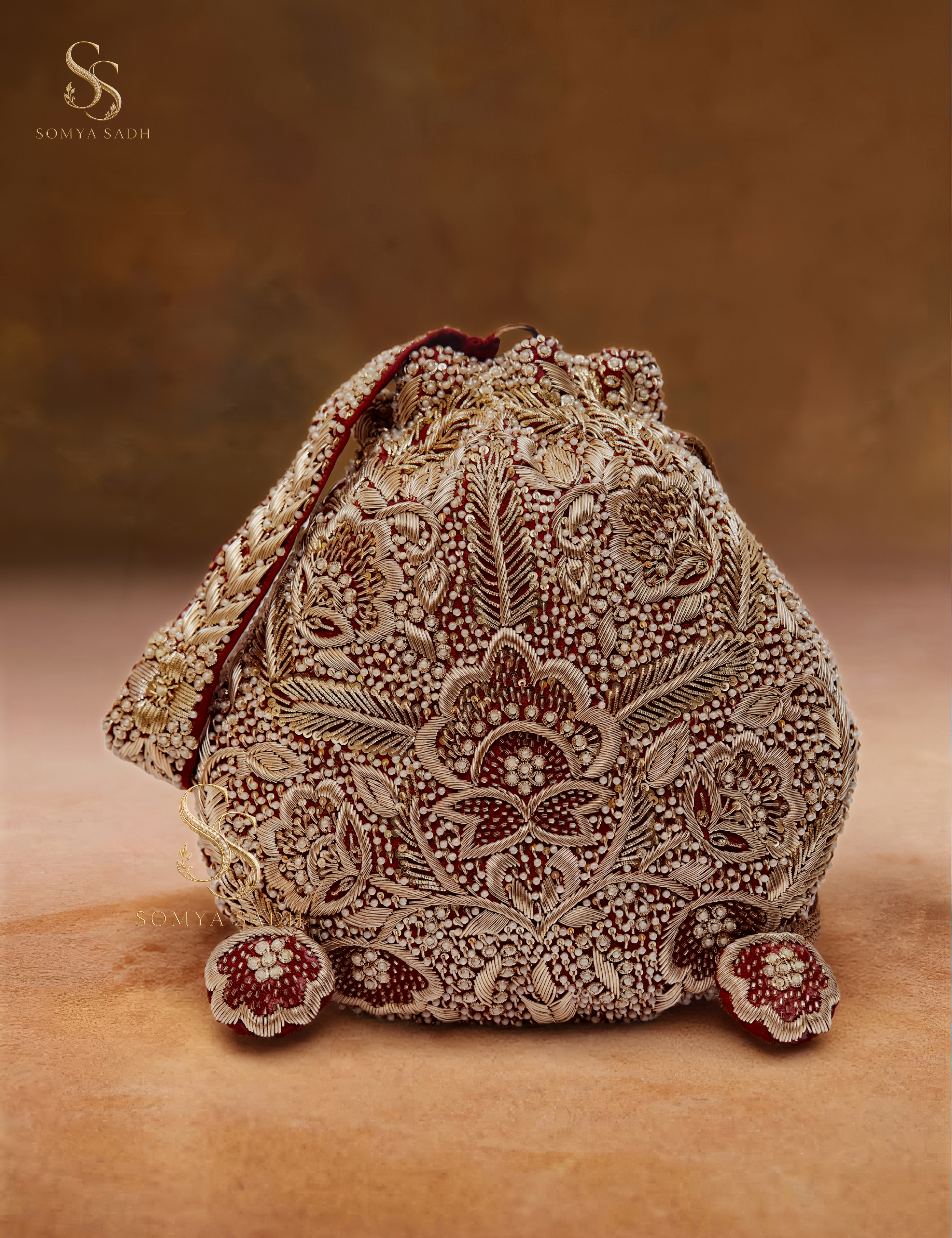 Nazakat Ivory Burgundy Filigree Potli, detail or alternate product view